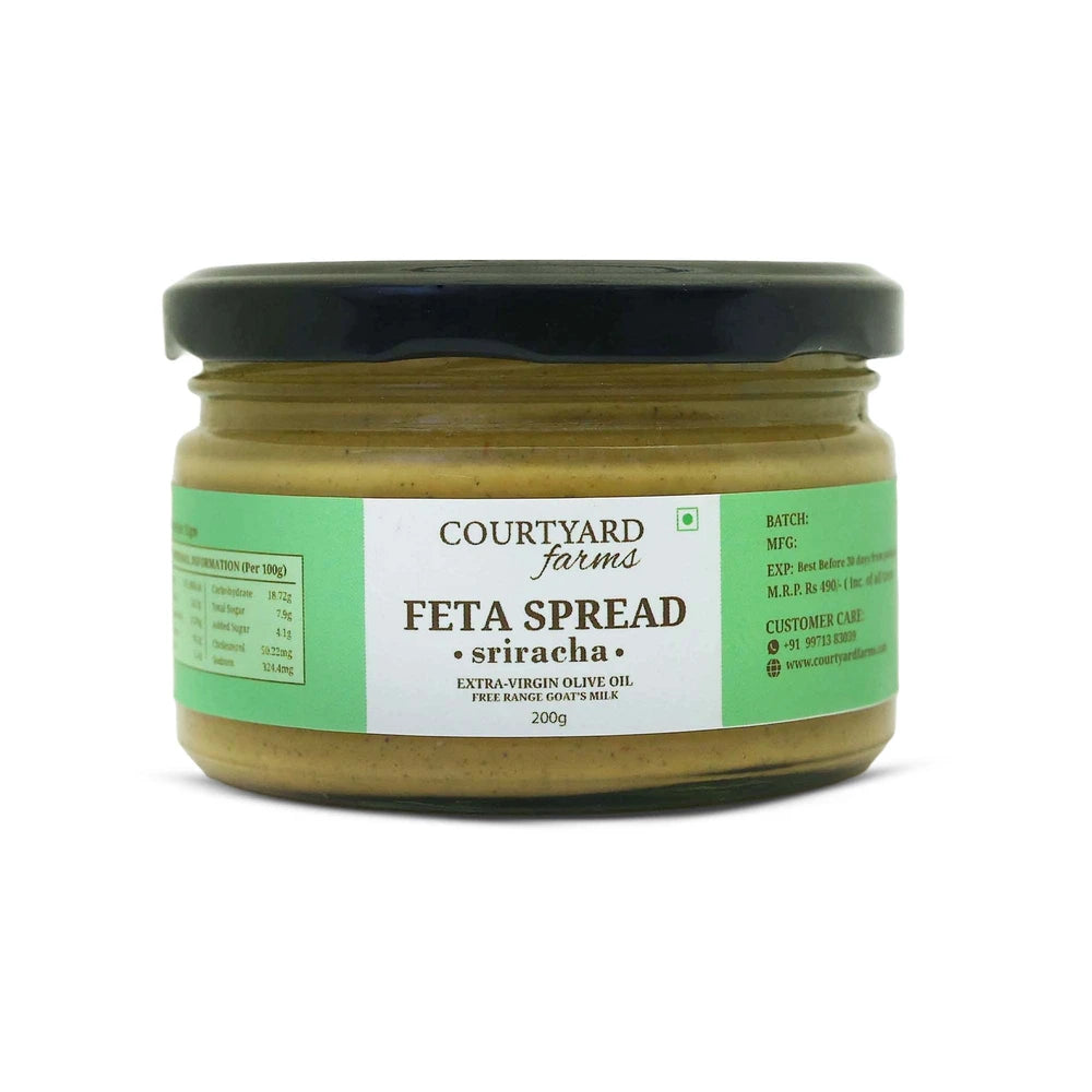 Jar of Courtyard Farms Feta Spread Sriracha on a white background