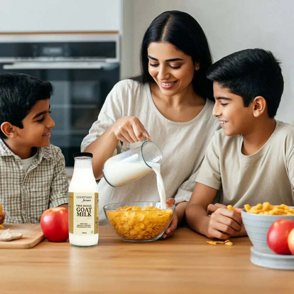 Family enjoying goat milk at breakfast healthy daily milk for kids and adults easy to digest