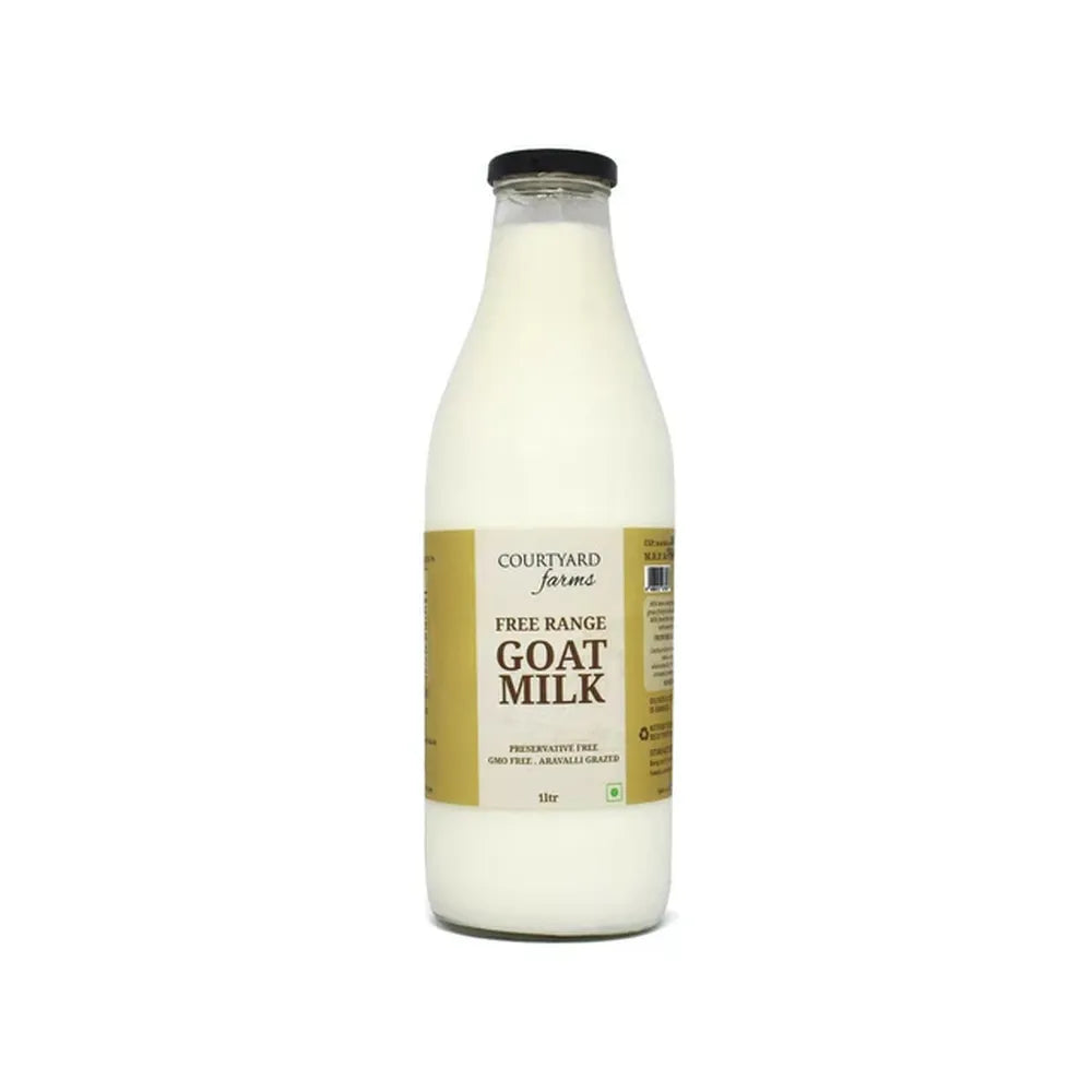 Fresh goat milk in glass bottle for home delivery natural preservative free dairy